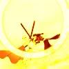 Sasame swordfighting with Hayate - golden-orange-yellow tinted icon