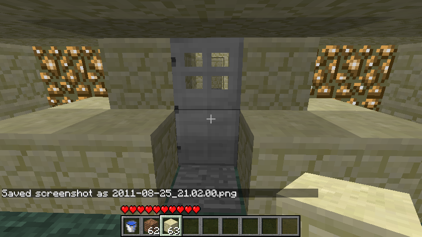 Notice the pressure plate on the ground, stepping on this retracts a piston causing lava to flow into the room.