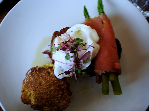 Potato and chive pancakes Potato and chive pancakes, poached egg, salmon & asparagus on pumpernickel brioche