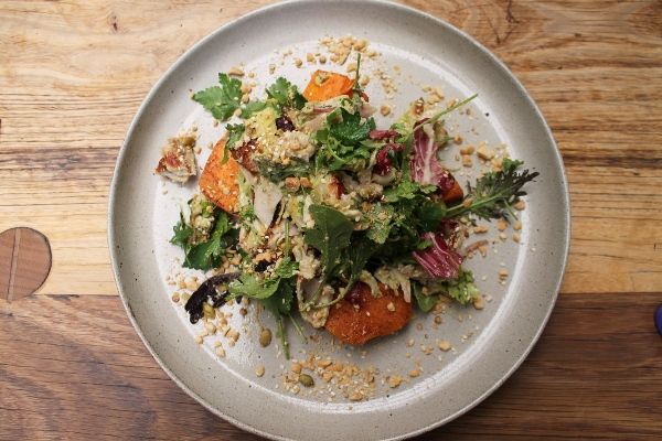 Asian drunken chicken salad, roasted sweet potato, spring onion, chili, leafs + nuts